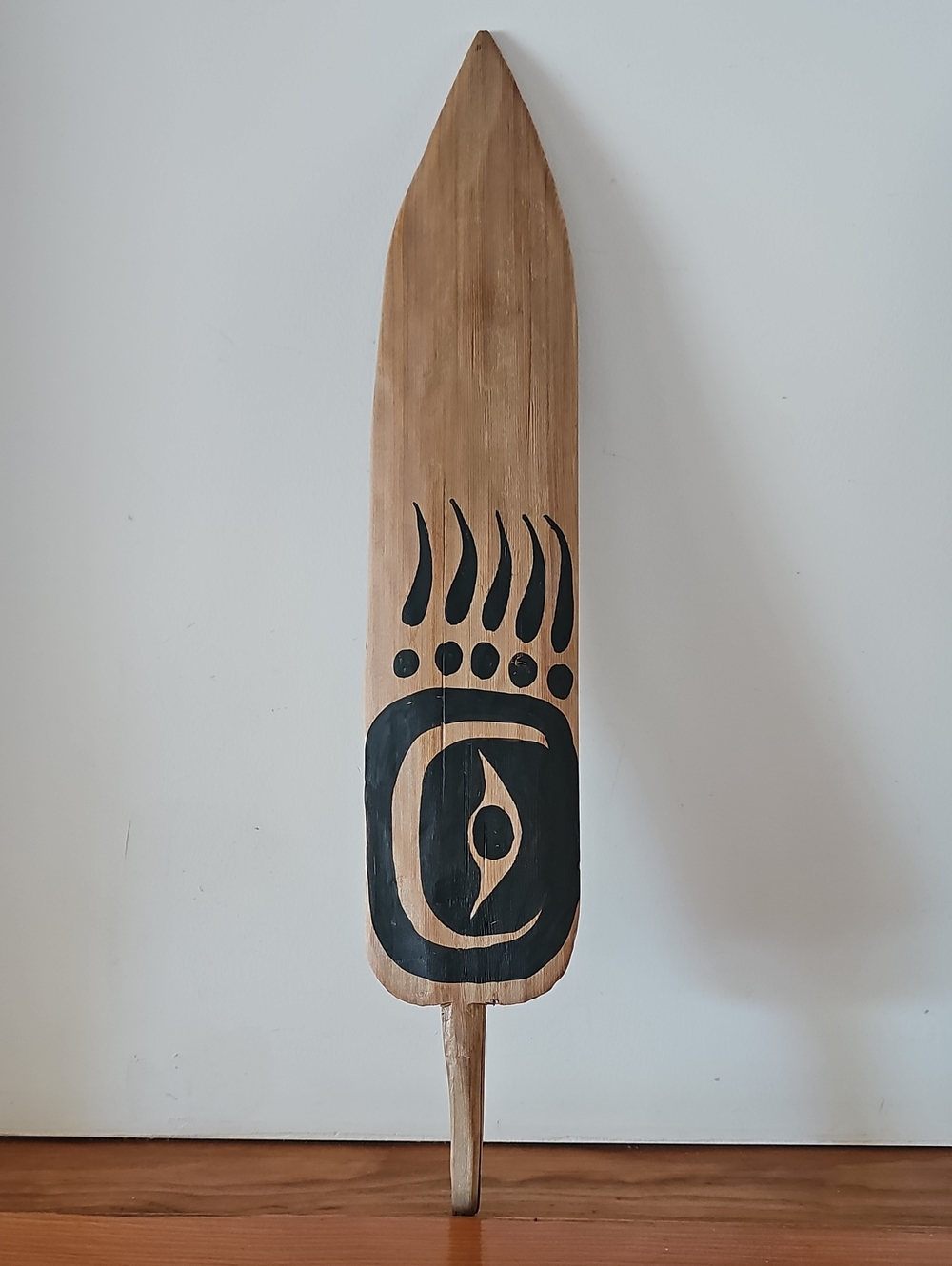 Hand-Carved Wooden Tribal Feather with Bear Claw Design